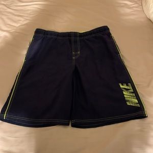 Mens Nike swim trunks with pockets and inside drawstring.